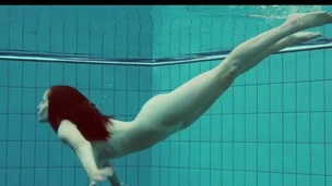 Bikini girl strips in the pool for skinny dipping fun